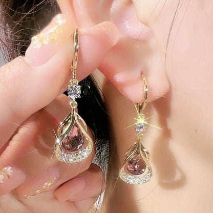 【Por tiempo limitado, compra 1 y llévate 1 gratis】Pendientes premium de ojo de gato 